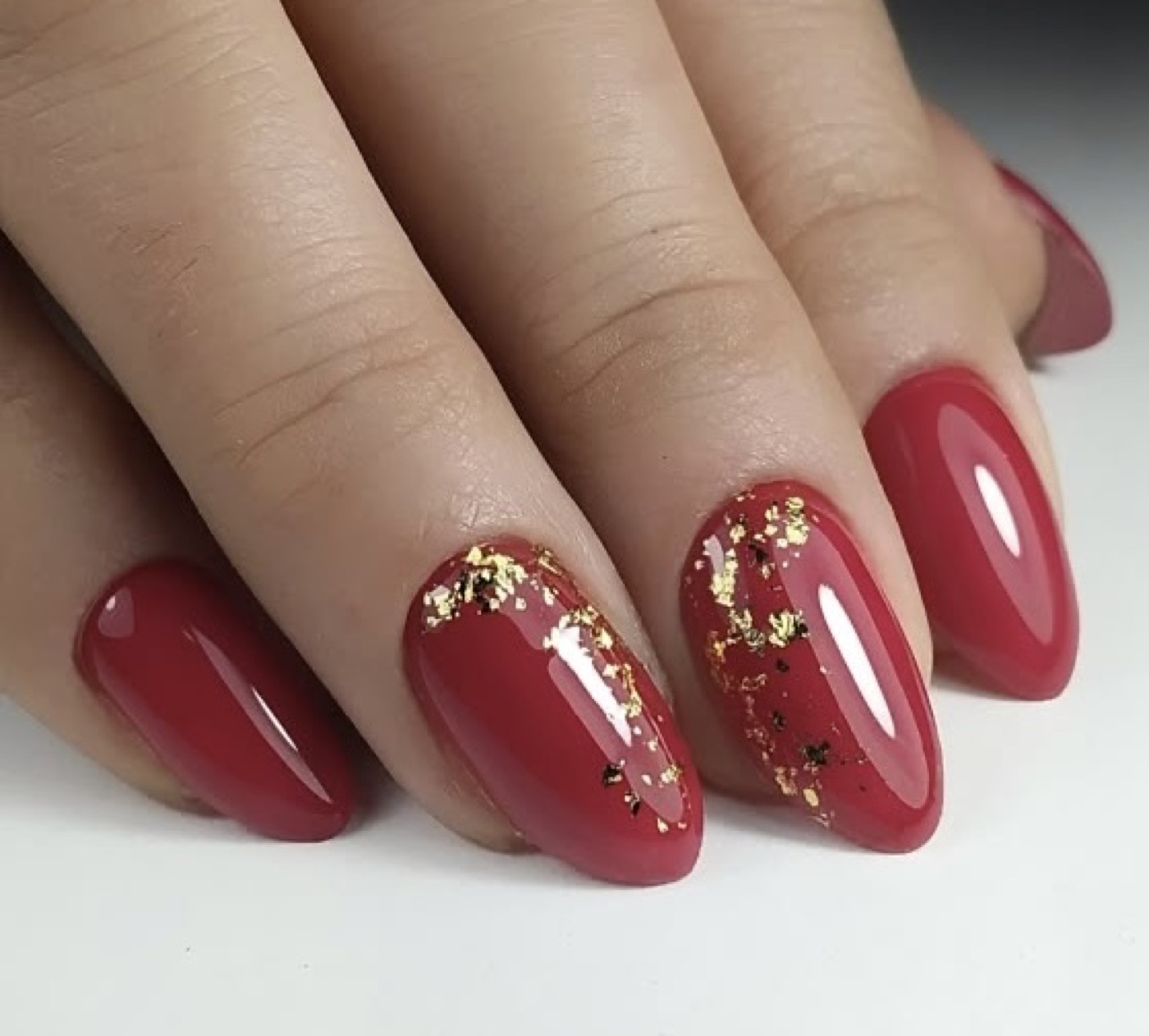 Shellac gel polish with gold foil